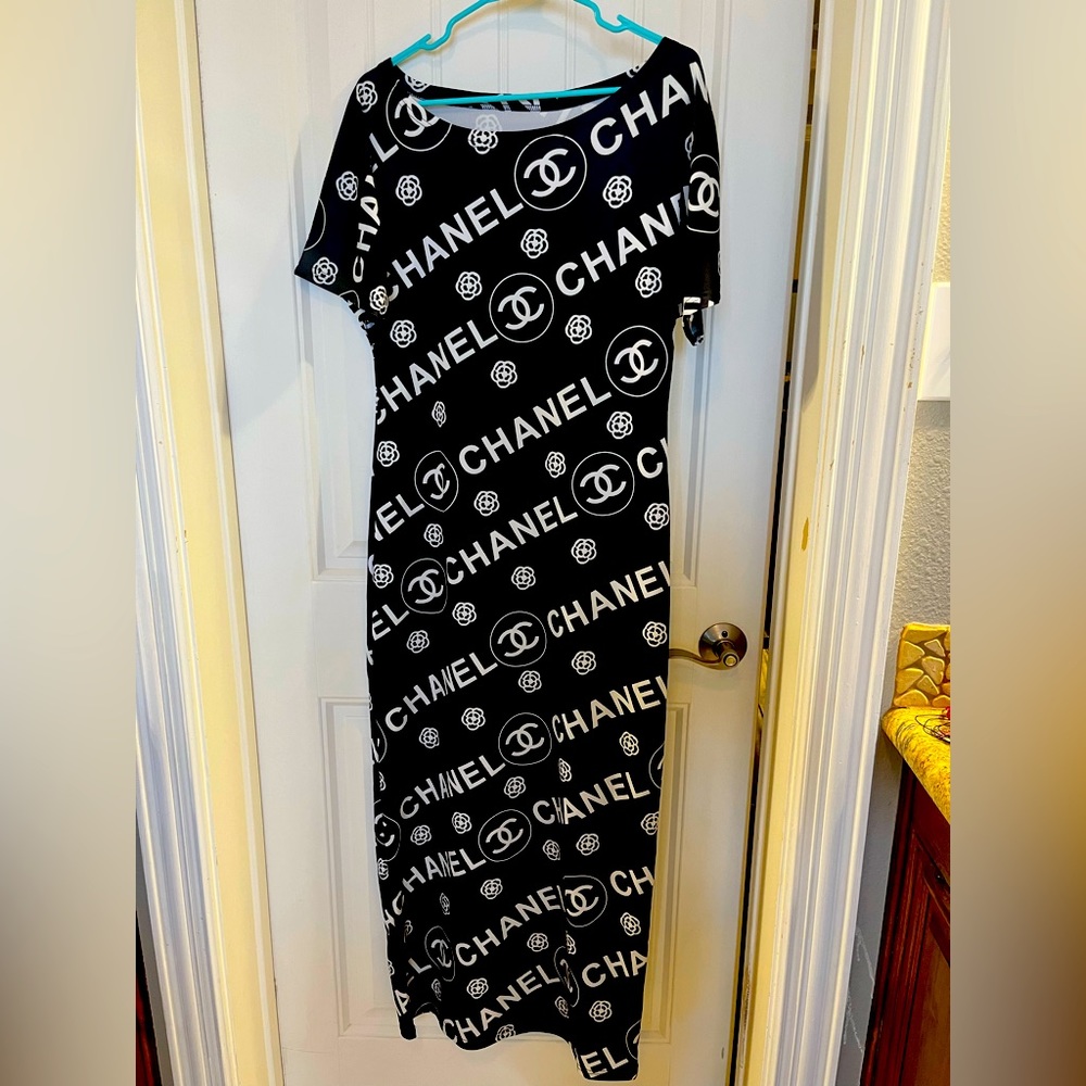 Chanel print dress. Unknown if it’s authentic Chanel brand. No tag- fits like M.